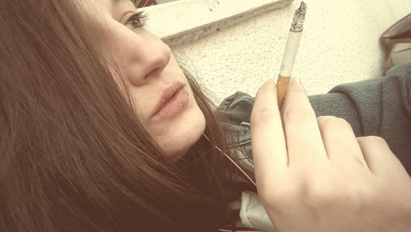 Smoking cigarettes 