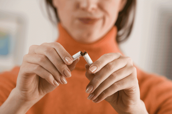 чому болить живіт після куріння